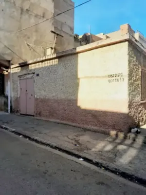 حوش للبيع فيي بتيلاك وهران